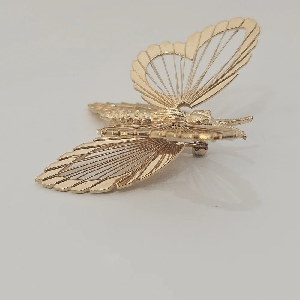 Vintage Monet gold tone butterfly brooch signed